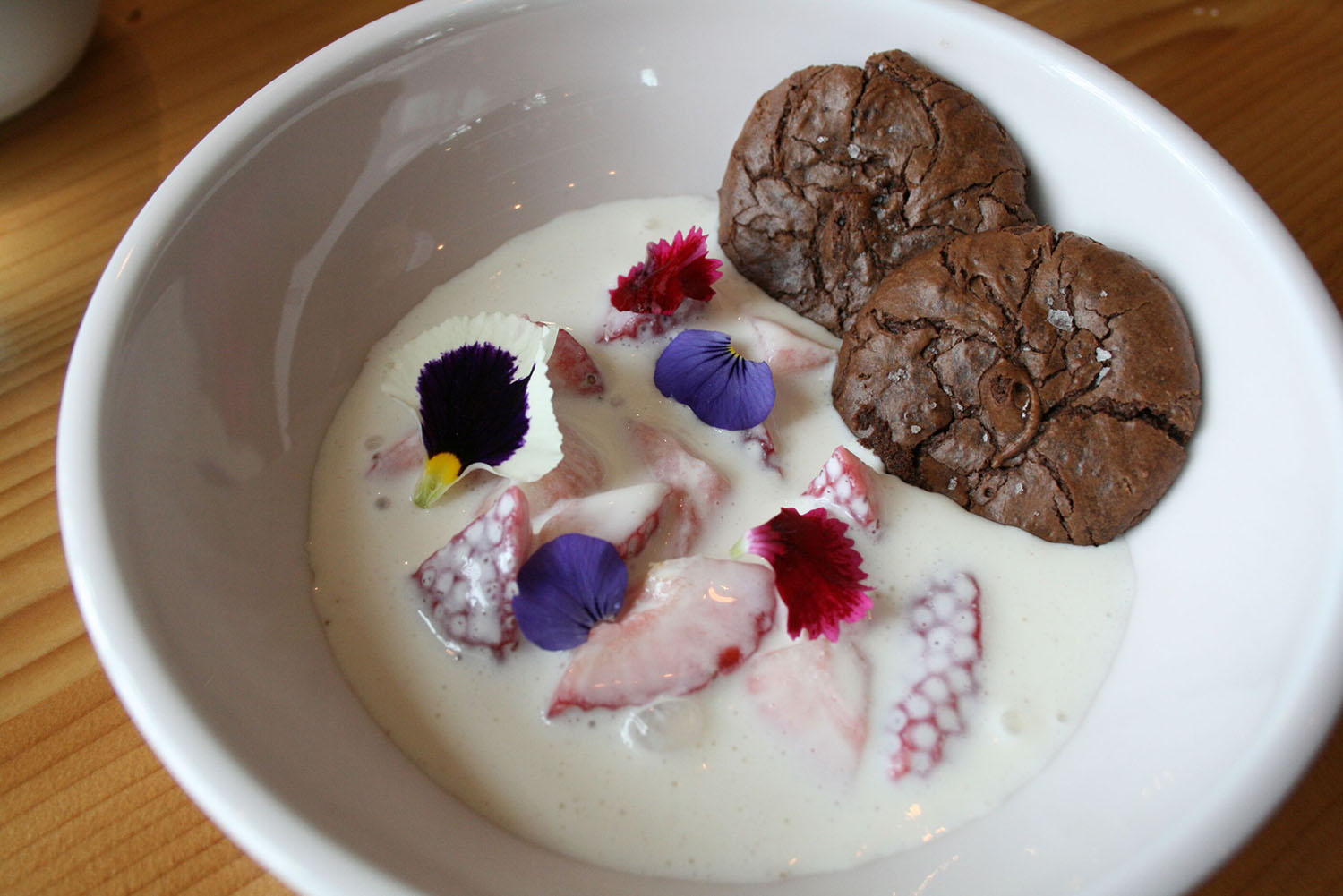 As beautiful as it is delicious. Strawberry Ambrosia on the brunch menu at Emmer & Rye on Rainey.